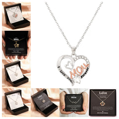Pendant necklace presented in a printed gift box with a message card