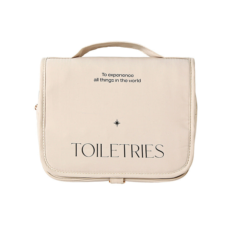 Travel storage bag set in beige color with text 'TOILETRIES' on front for organizing personal items.