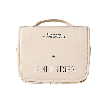 Travel storage bag set in beige color with text 'TOILETRIES' on front for organizing personal items.