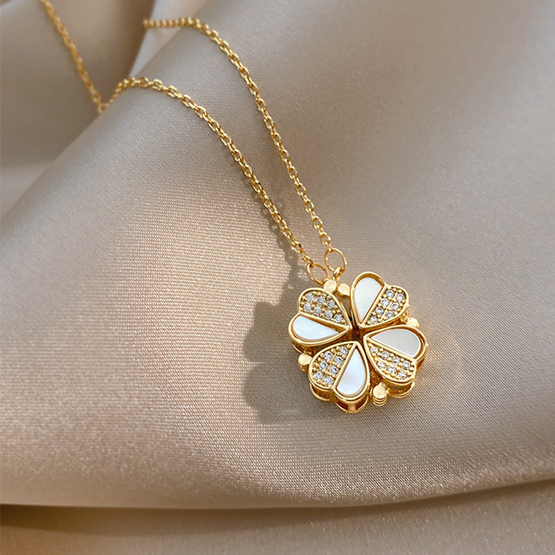 Four leaf clover necklace shown in silver and gold finishes